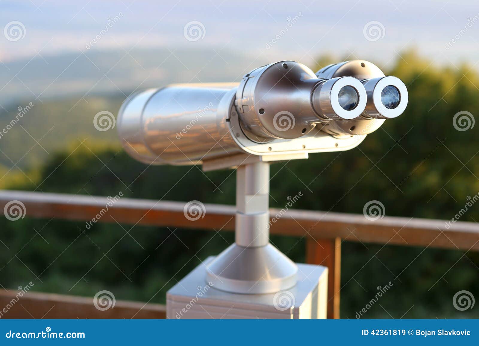 coin-operated binoculars on a vantage point overlooking the city