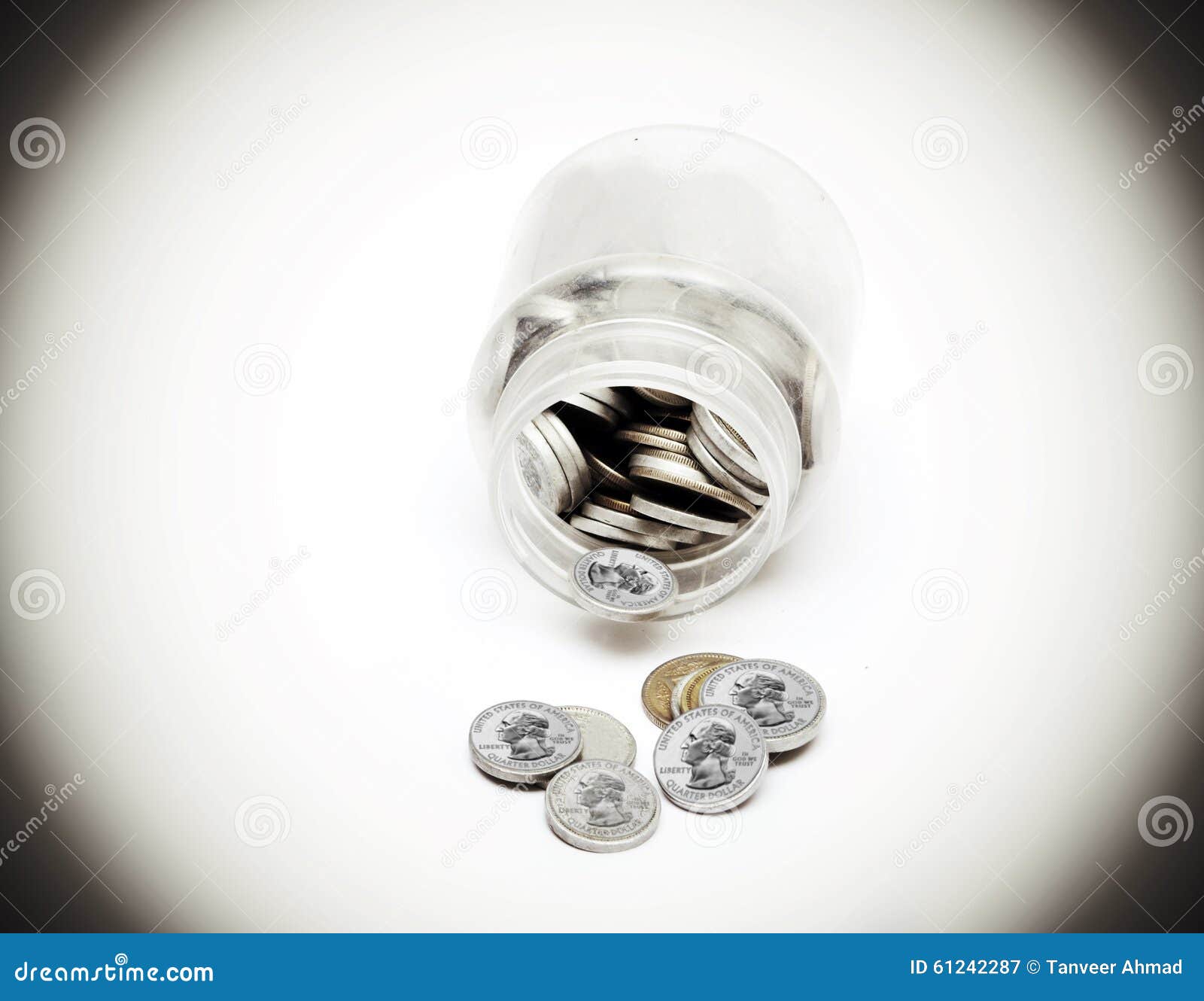 Coins of American Currency Coming Out of Saving Jar Stock Image Image