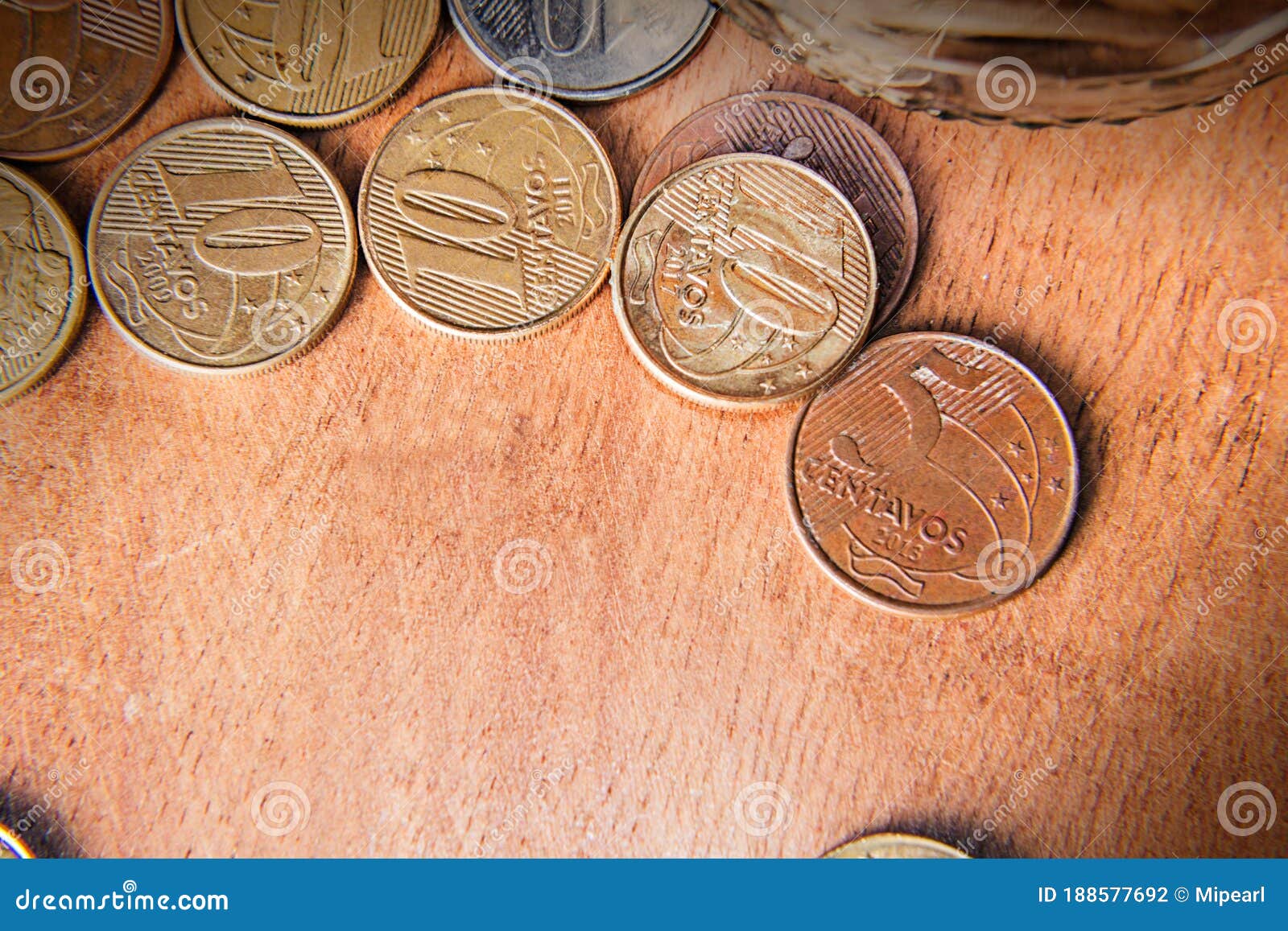 coins and banknotes on the wood table