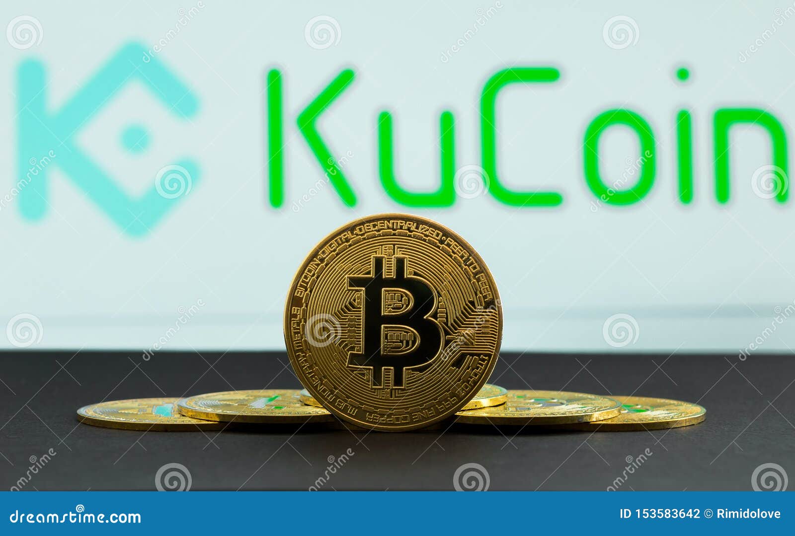 The Coins Of Bitcoin Are In Front Of Logo Of Ku Coin ...