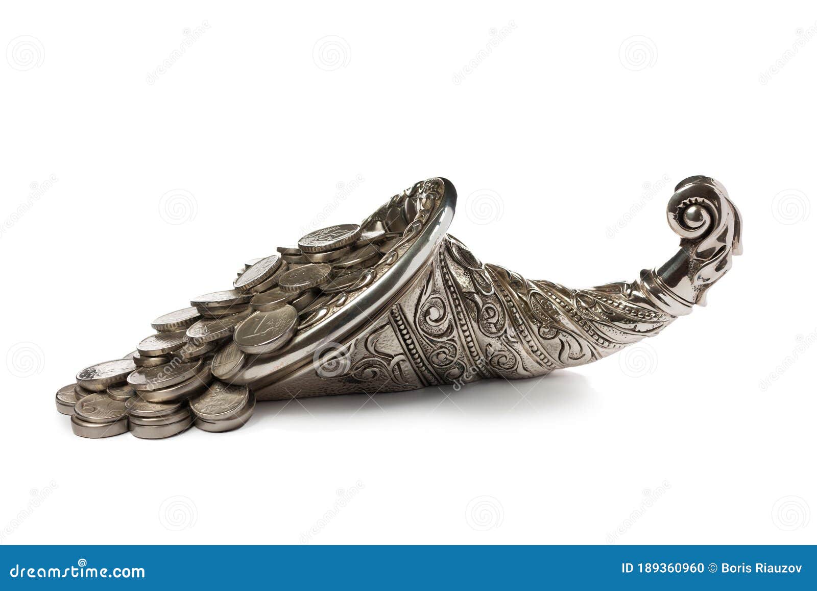 Coins Pour Out of the Silver Horn of Plenty. Isolated on White