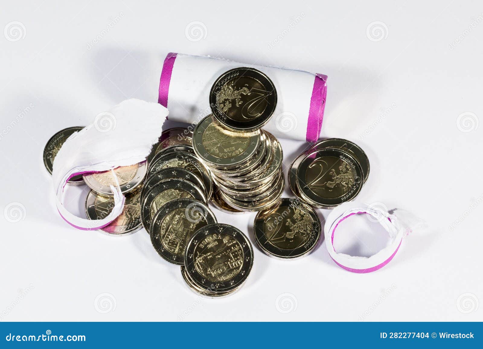 Coins and a Roll of Paper are Arranged Together on a Table Stock Photo Image of wealth