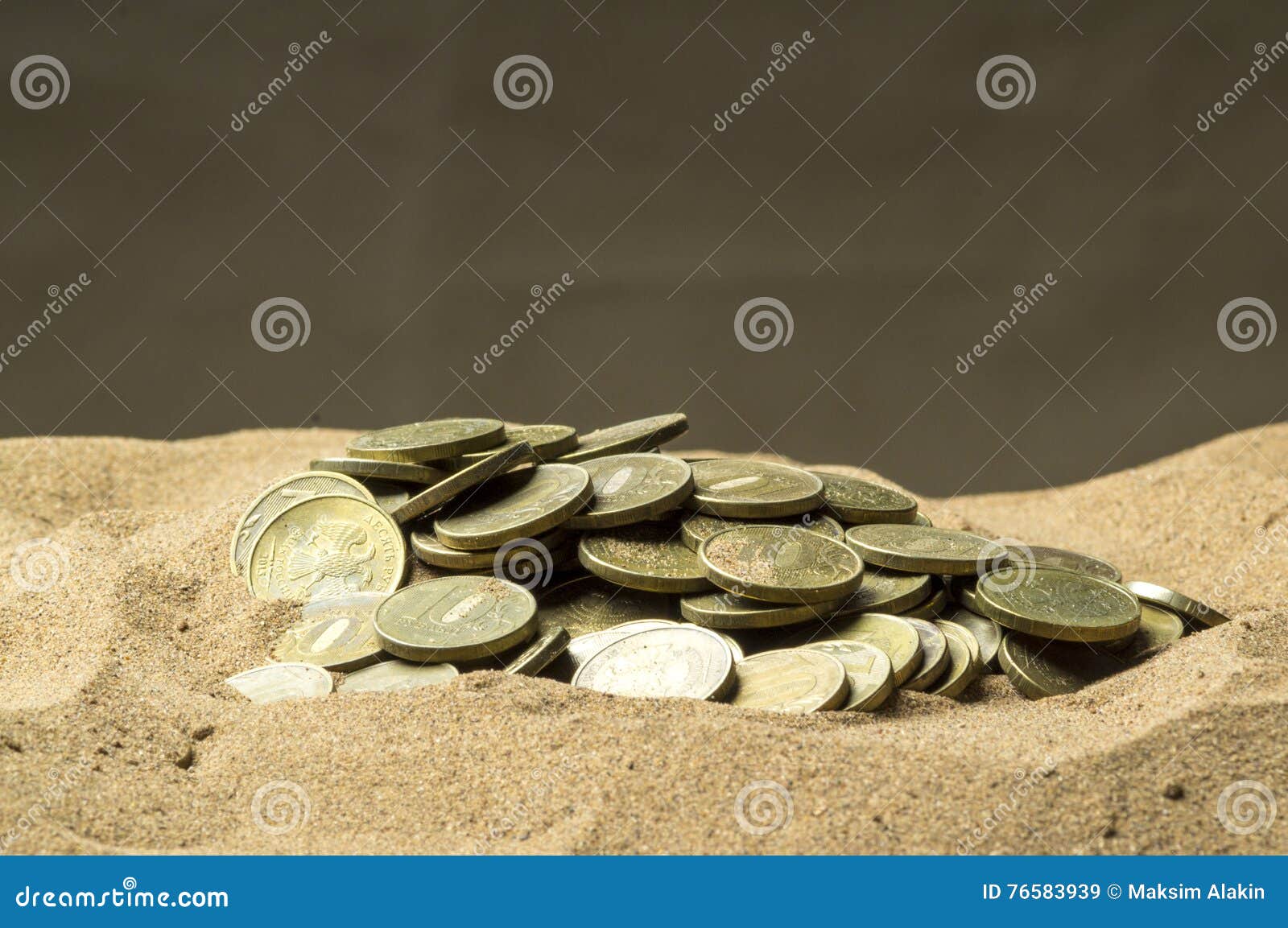 Coins in the sand stock image. Image of numismatic, dollar 76583939