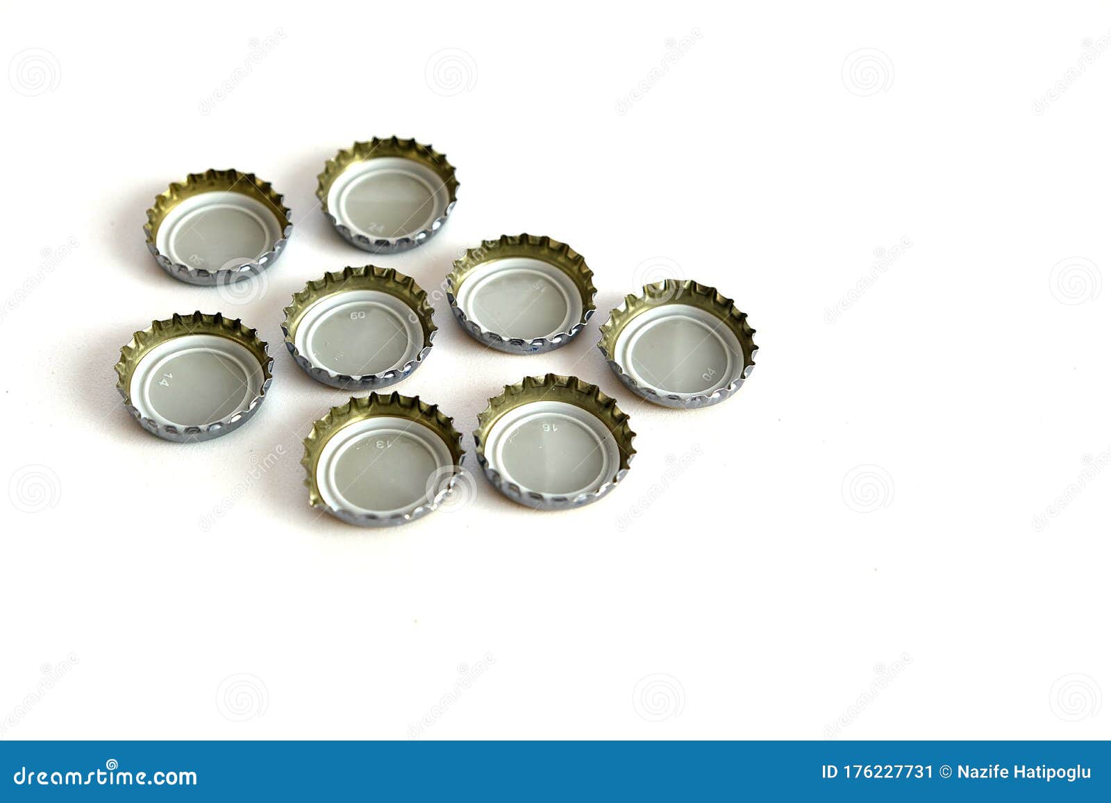 Coke and Soda Lid on White Floor, Many Soda Bottle Caps Stock Image