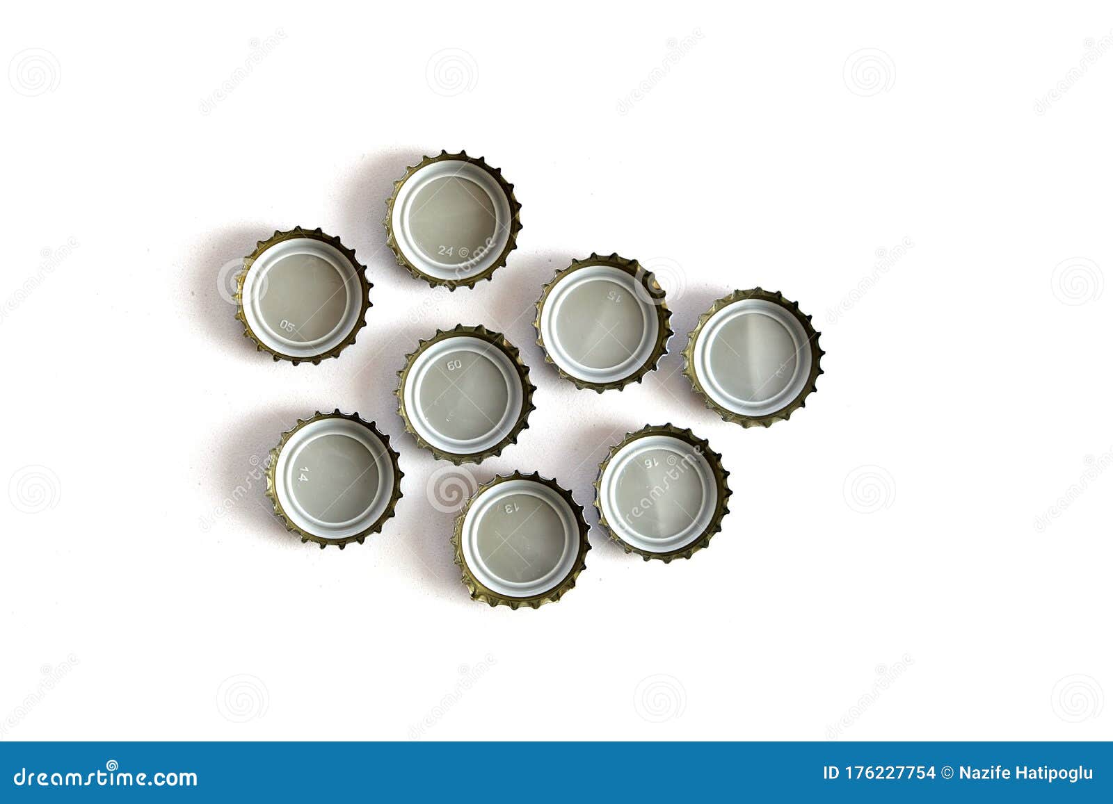 Coke and Soda Lid on White Floor, Many Soda Bottle Caps Stock Photo