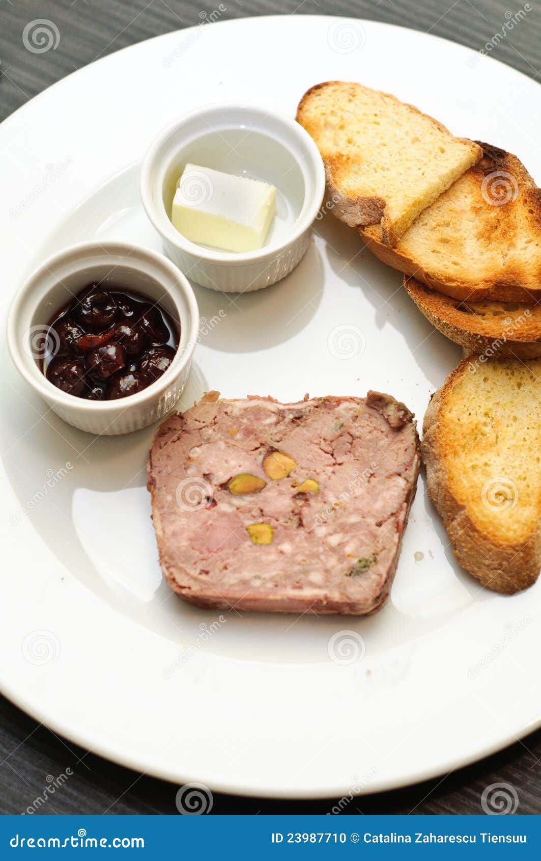 Cold Appetizer with Duck Terrine and Cherry Sauce Stock Photo Image
