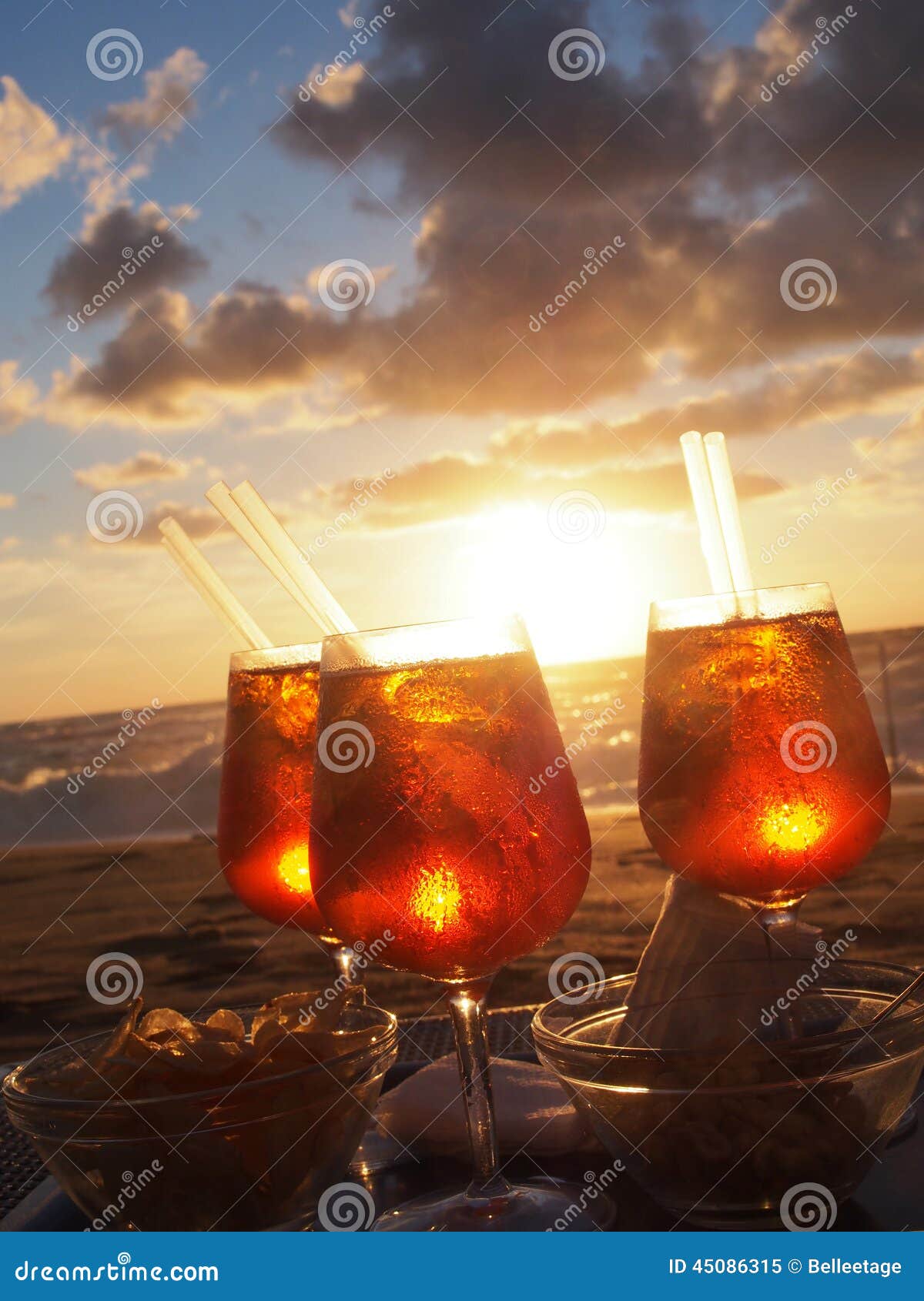 Cold drink at the beach stock image. Image of glasses - 45086315