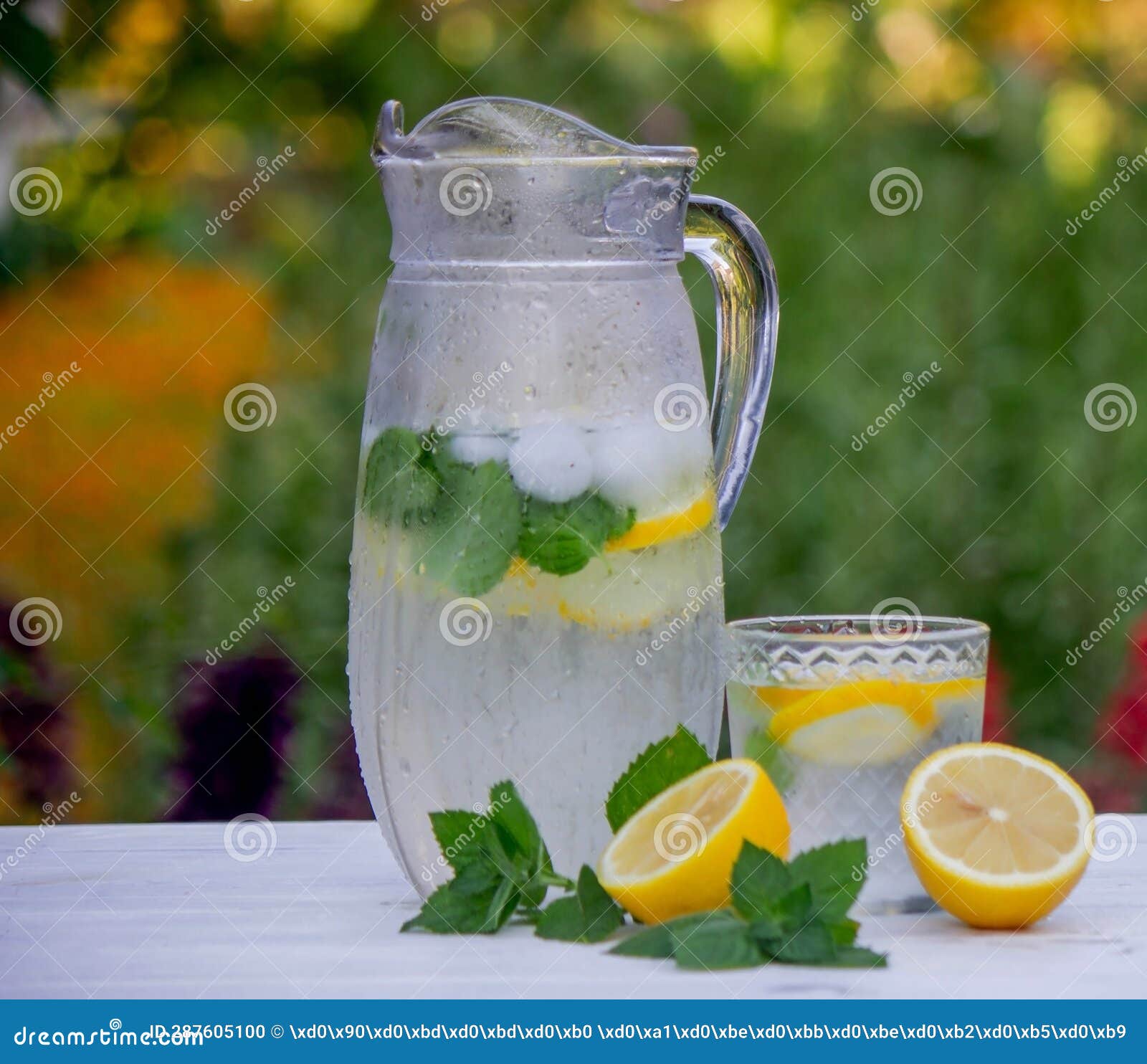 Cold Lemonade with Fresh Lemon and Crushed Ice Cubes. Selective Focus