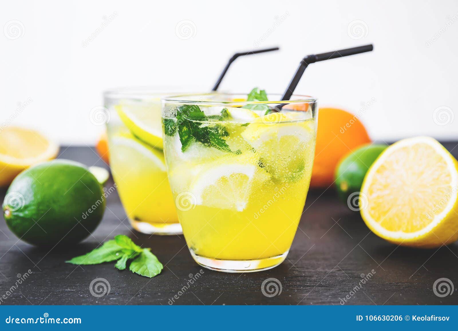 Cold Refreshing Citrus Drinks with Lemon and Limes. Tropical Concept