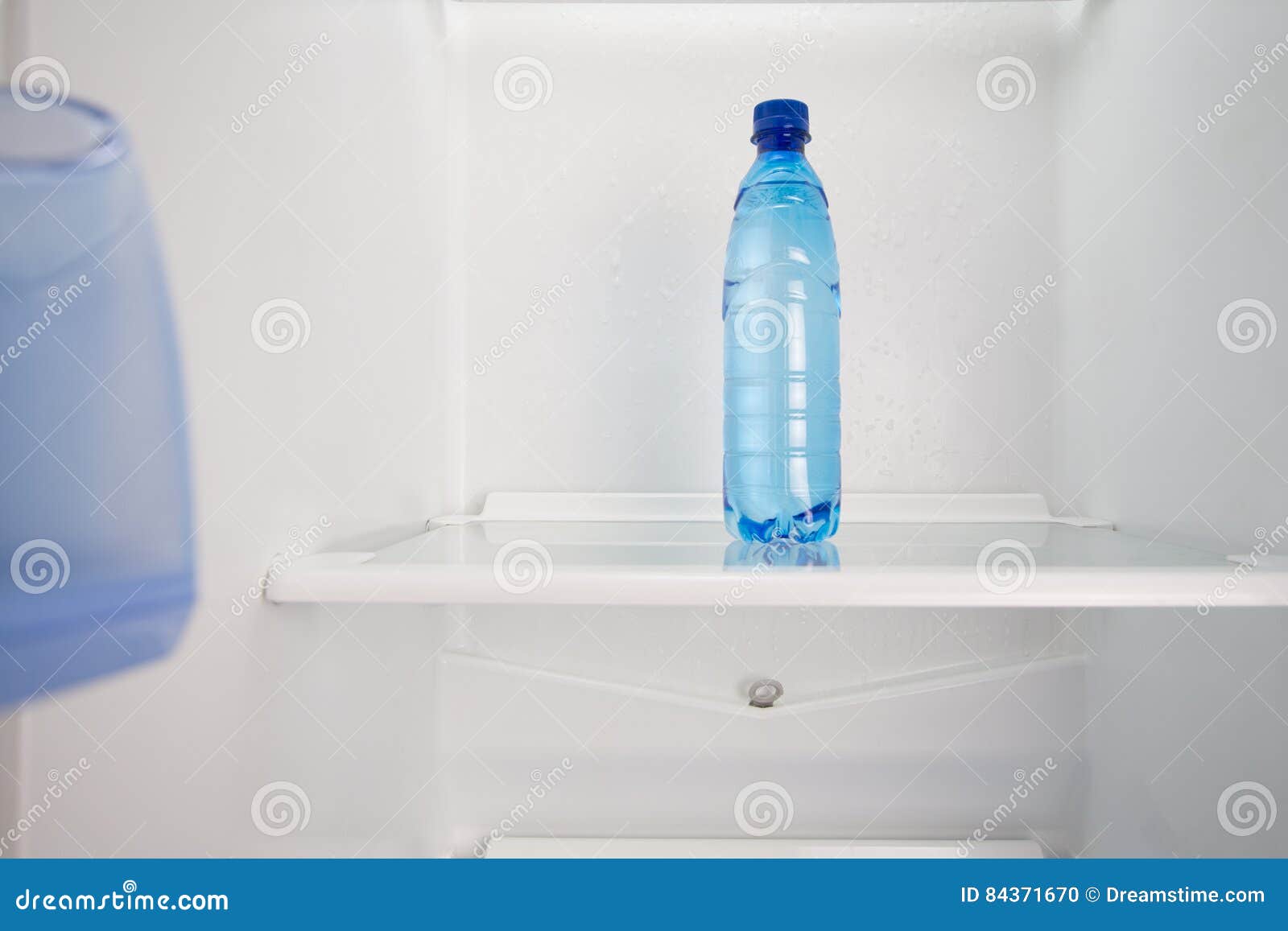 Cold Water on a Shelve in the Fridge. Stock Photo Image of fridge
