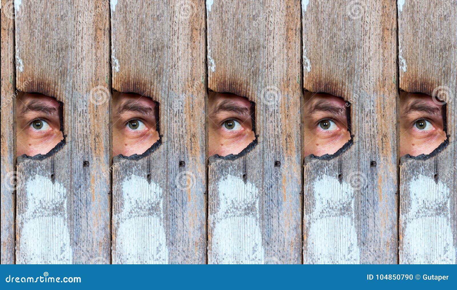 Collage of the Human Eye, Voyeur Spying through a Hole in the Old Wooden Fence Stock Photo photo photo