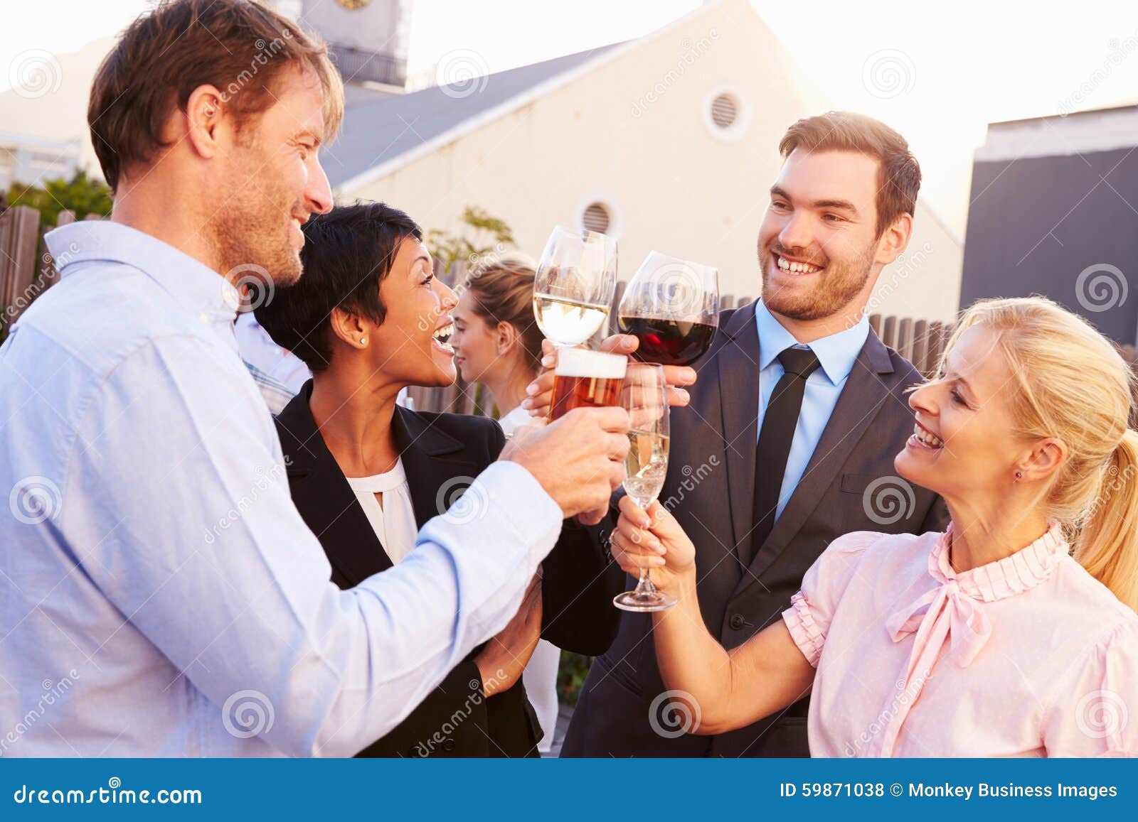 Colleagues Drinking after Work at a Rooftop Bar Stock Photo Image of