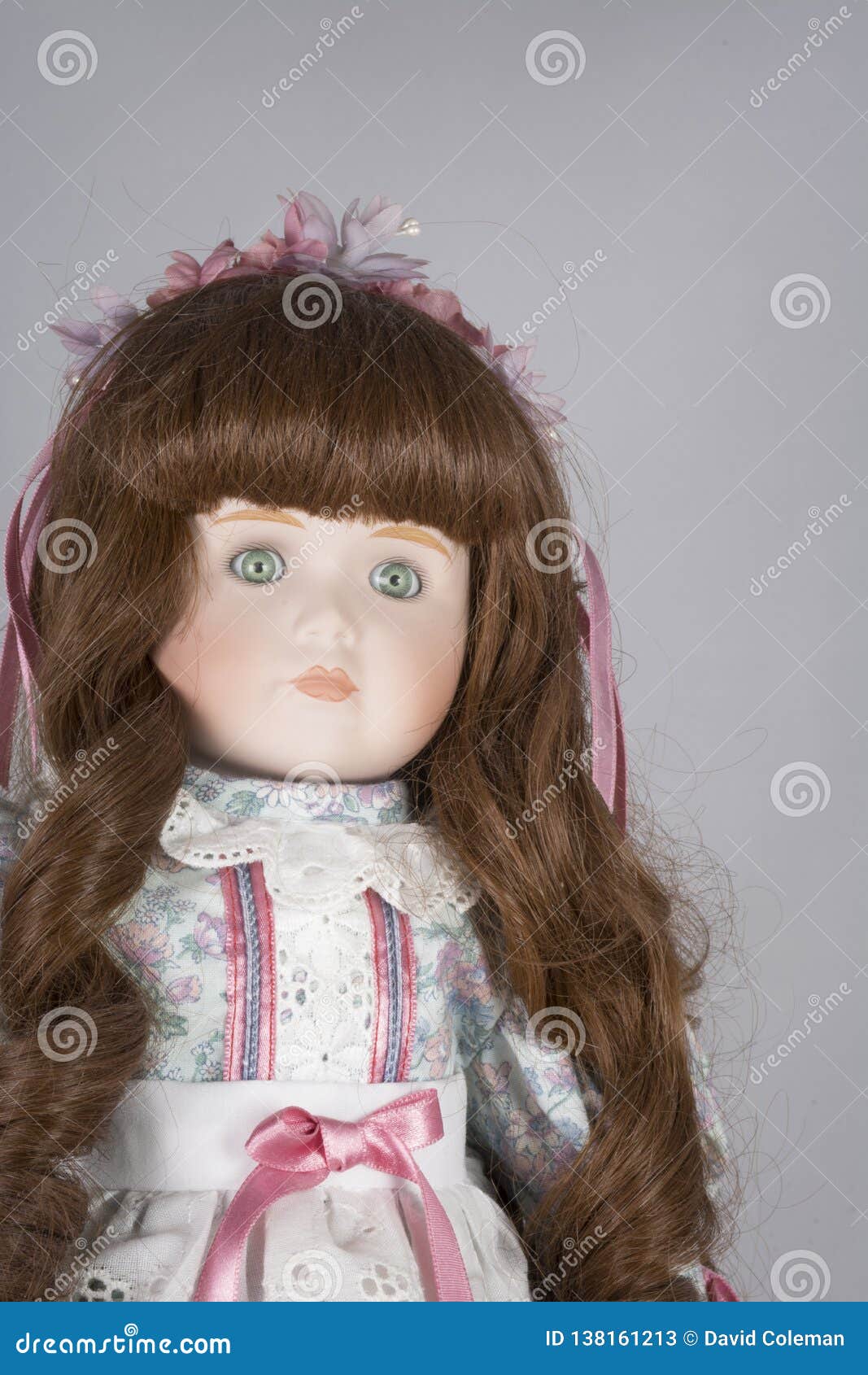 collectable porcelain doll on white