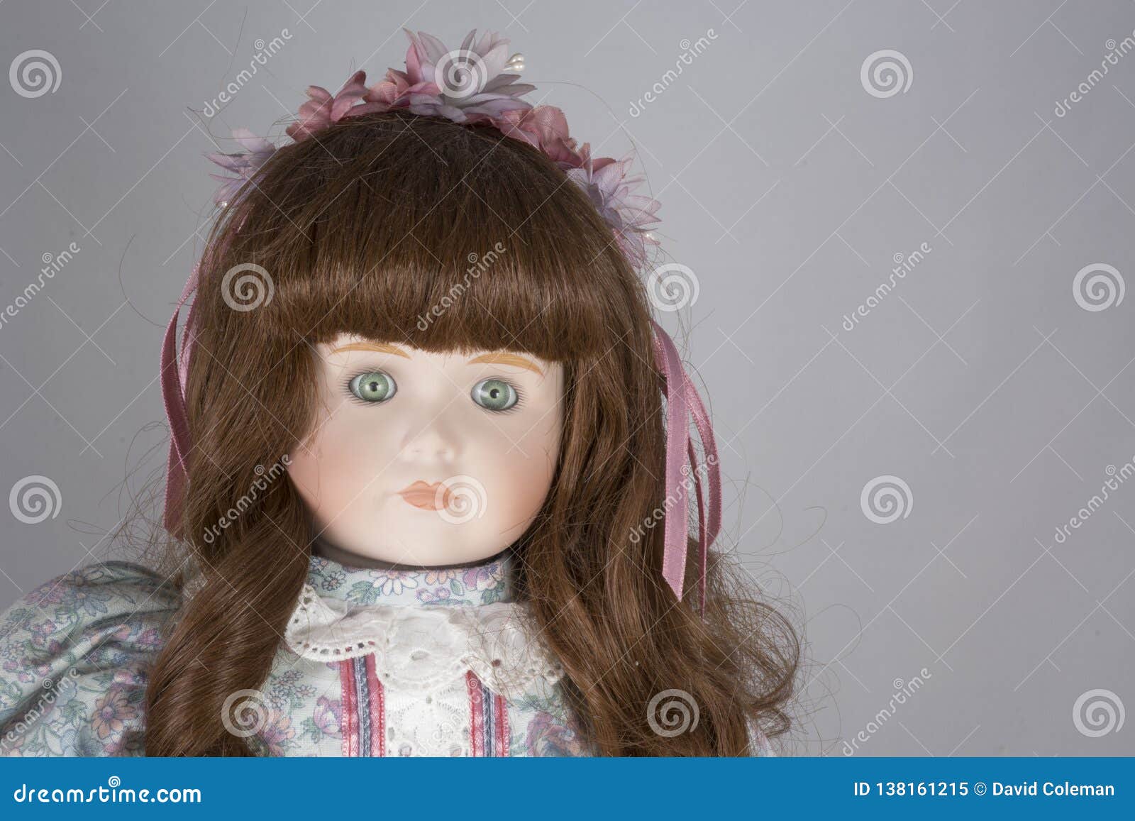 collectable porcelain doll on white