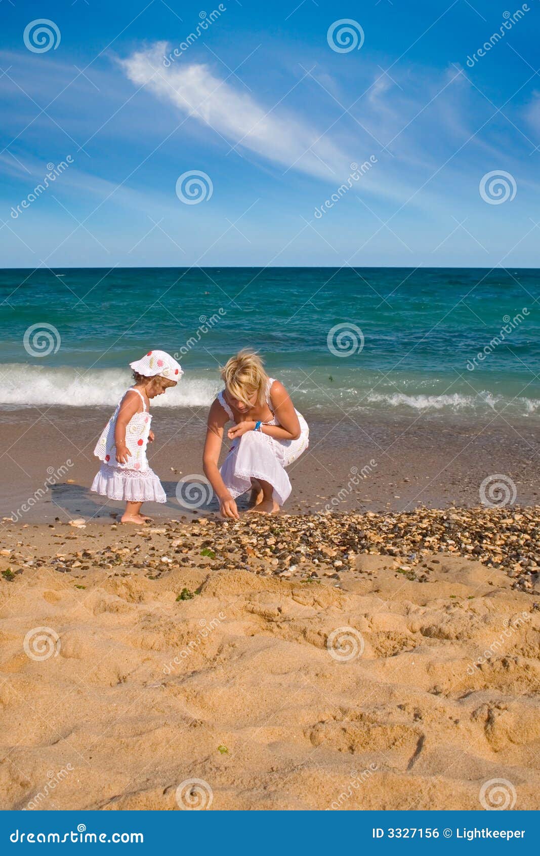 Collecting seashells stock photo. Image of collecting 3327156