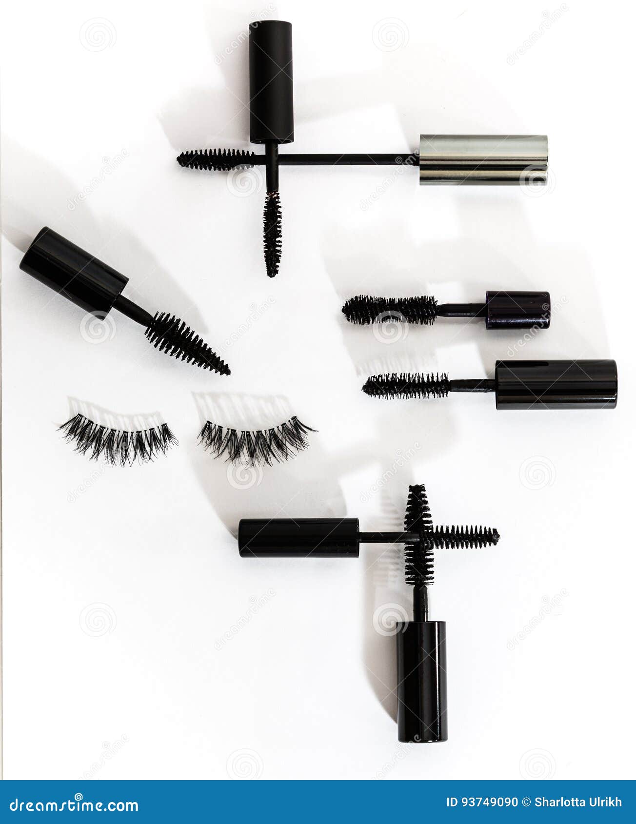 Collection of Different Mascara Brushes on a White Background. Stock