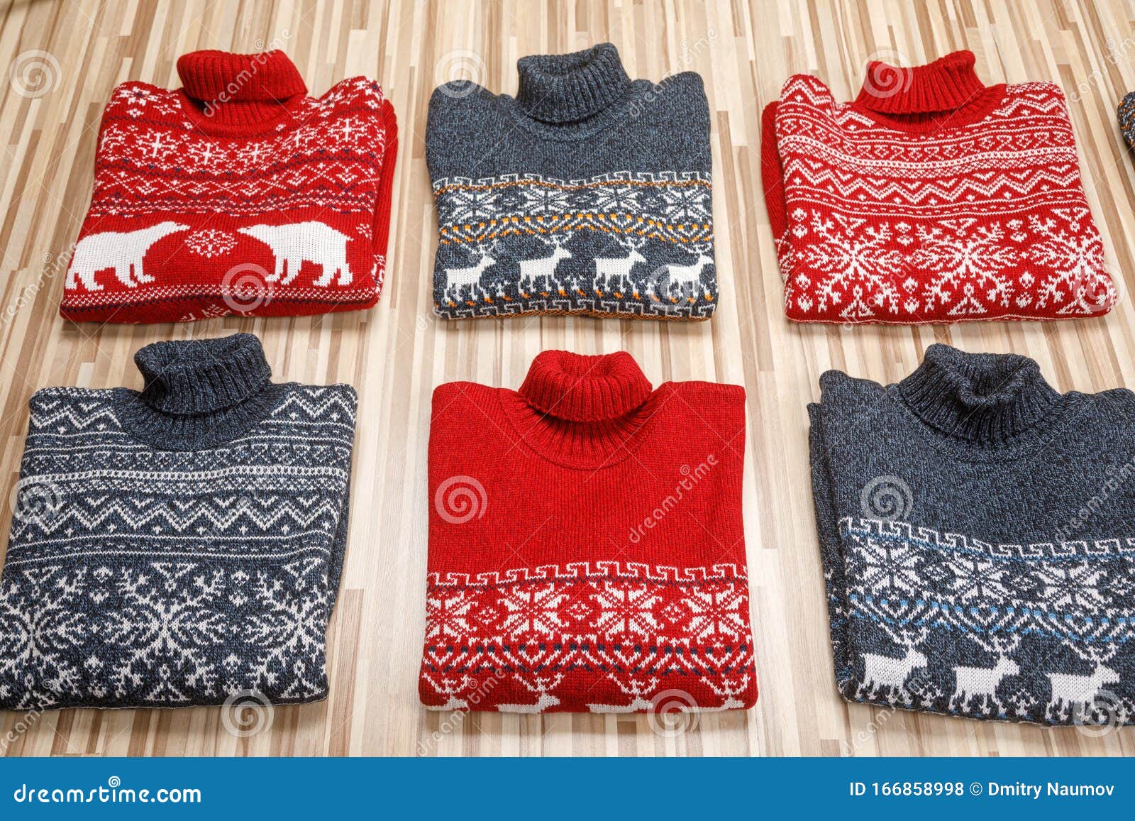 Collection of Knitted Christmas Turtleneck Sweaters Folded on Wooden ...