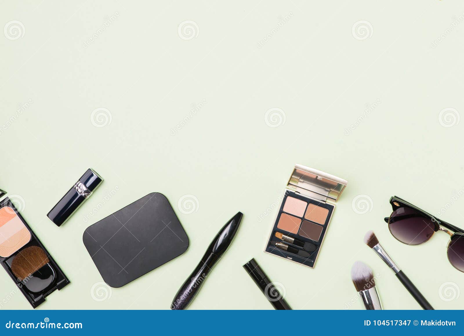 A Collection of Make Up and Cosmetic Beauty Green Background Stock ...