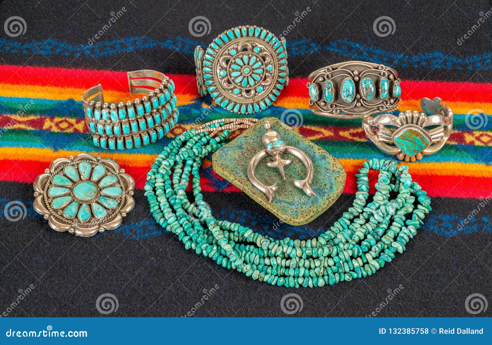 collection of native american jewelry, turquoise and sterling silver.