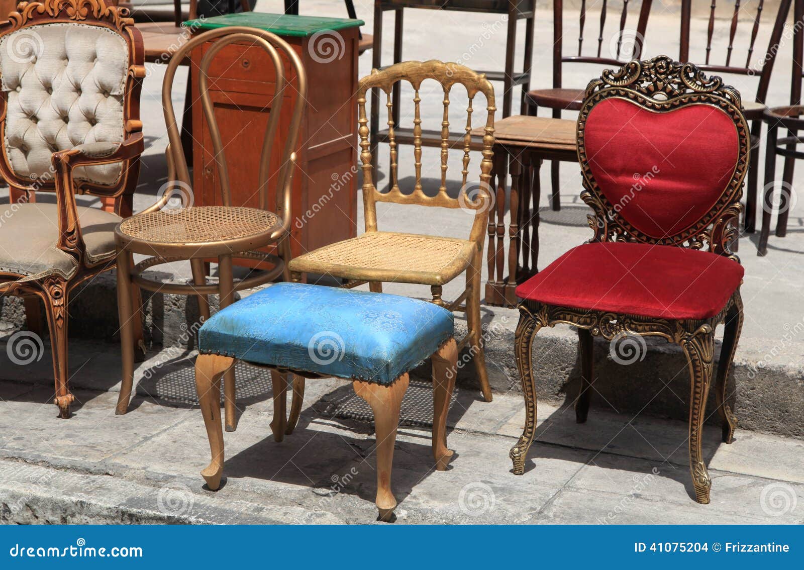 Collection of Old Broken Chairs on the Flea Market. Stock Photo Image