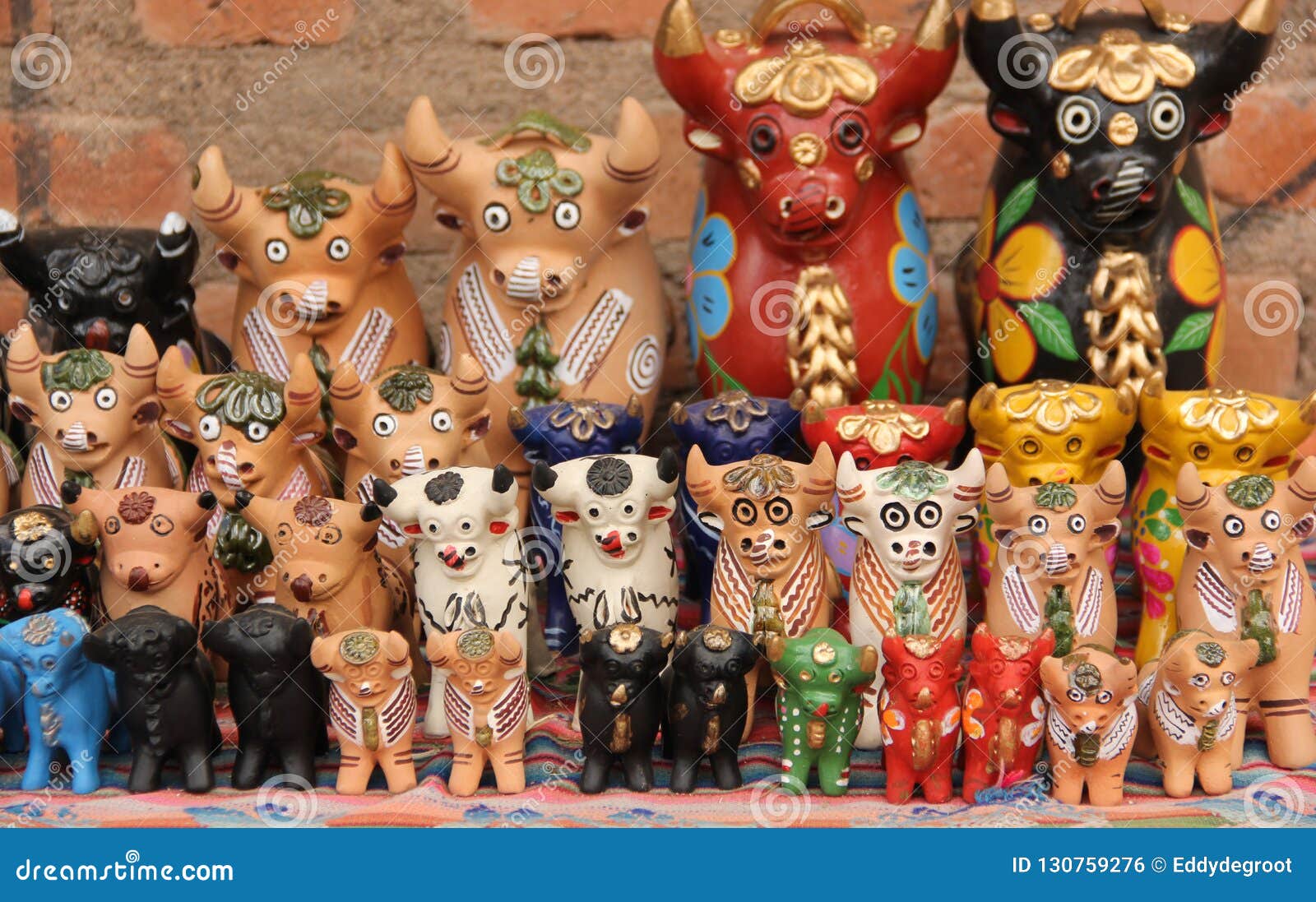 a collection of pucara bull statues