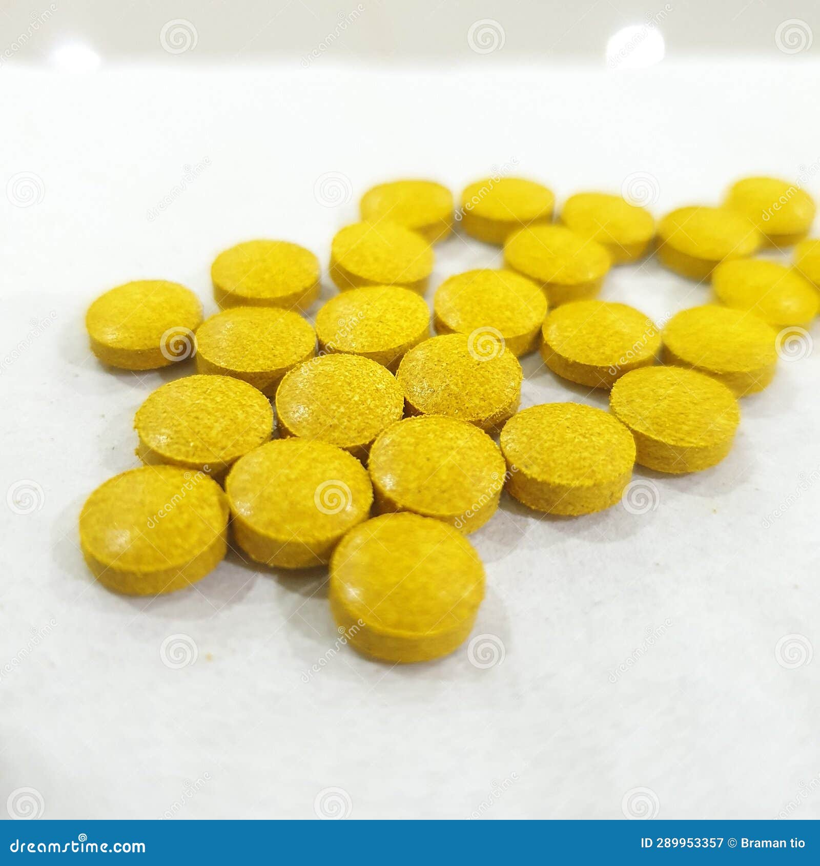 A Collection of Round and Yellow Colored Tablets Stock Image Image of