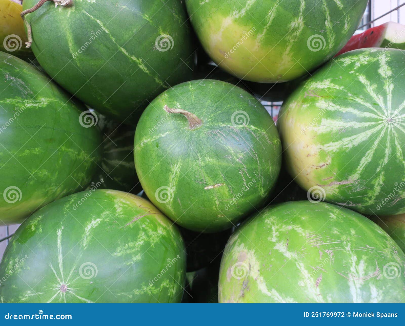 Collection of Watermelons in Front of a Grocery Store Stock Photo