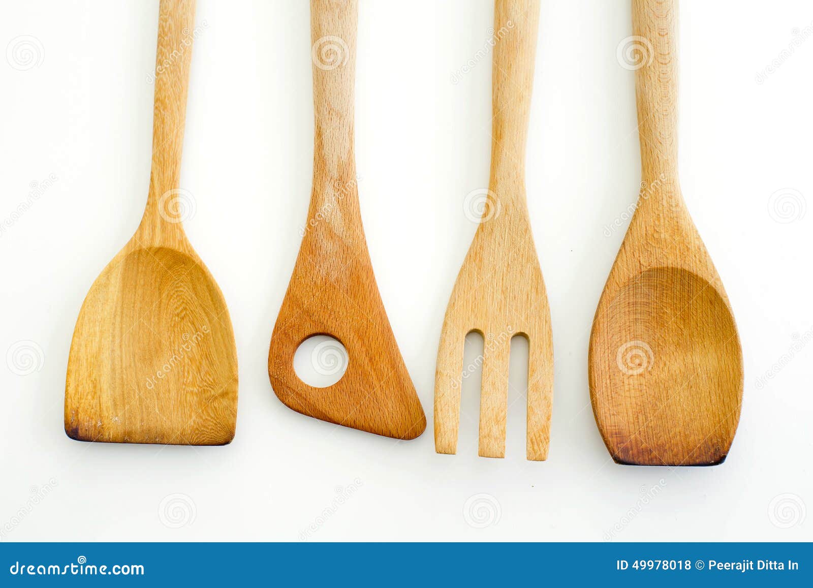A collection of wooden kitchen utensils isolated on white color background