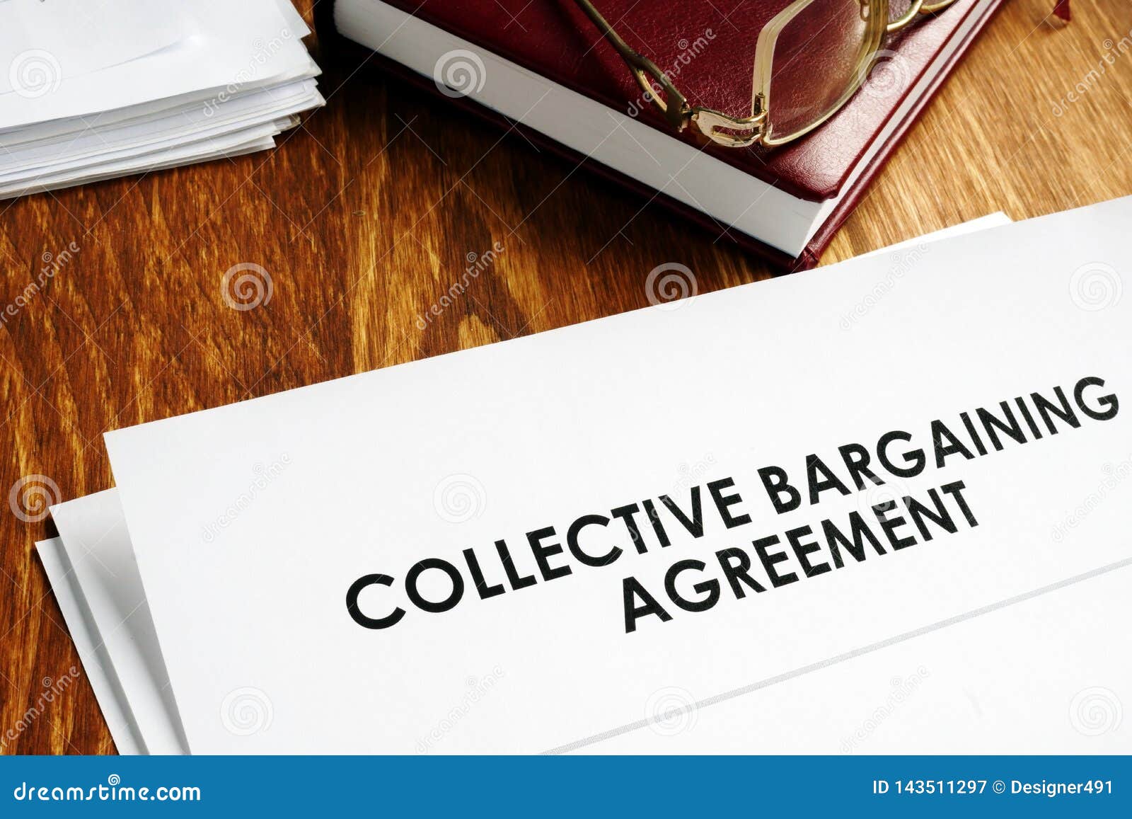 collective bargaining agreement and note pad