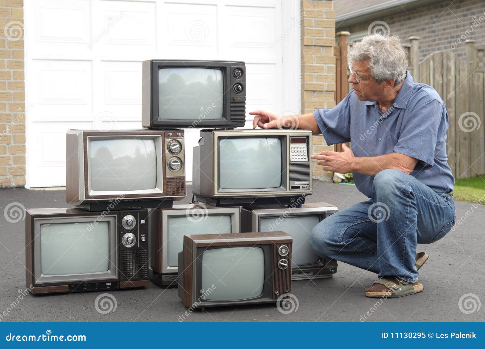 Collector of old TV sets stock image. Image of senior 11130295