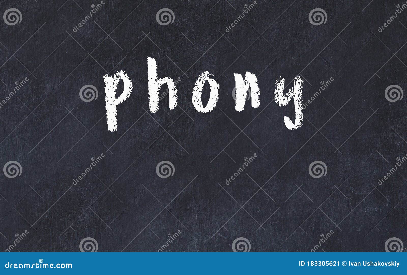 college chalk desk with the word phony written on in