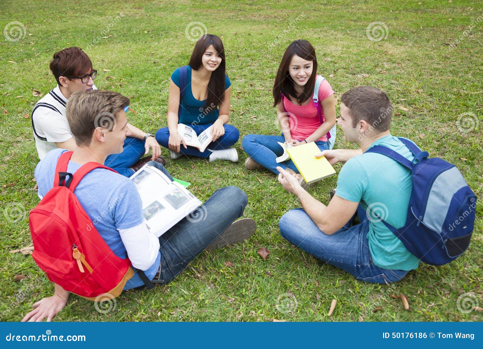 college students studying and discuss together in campus