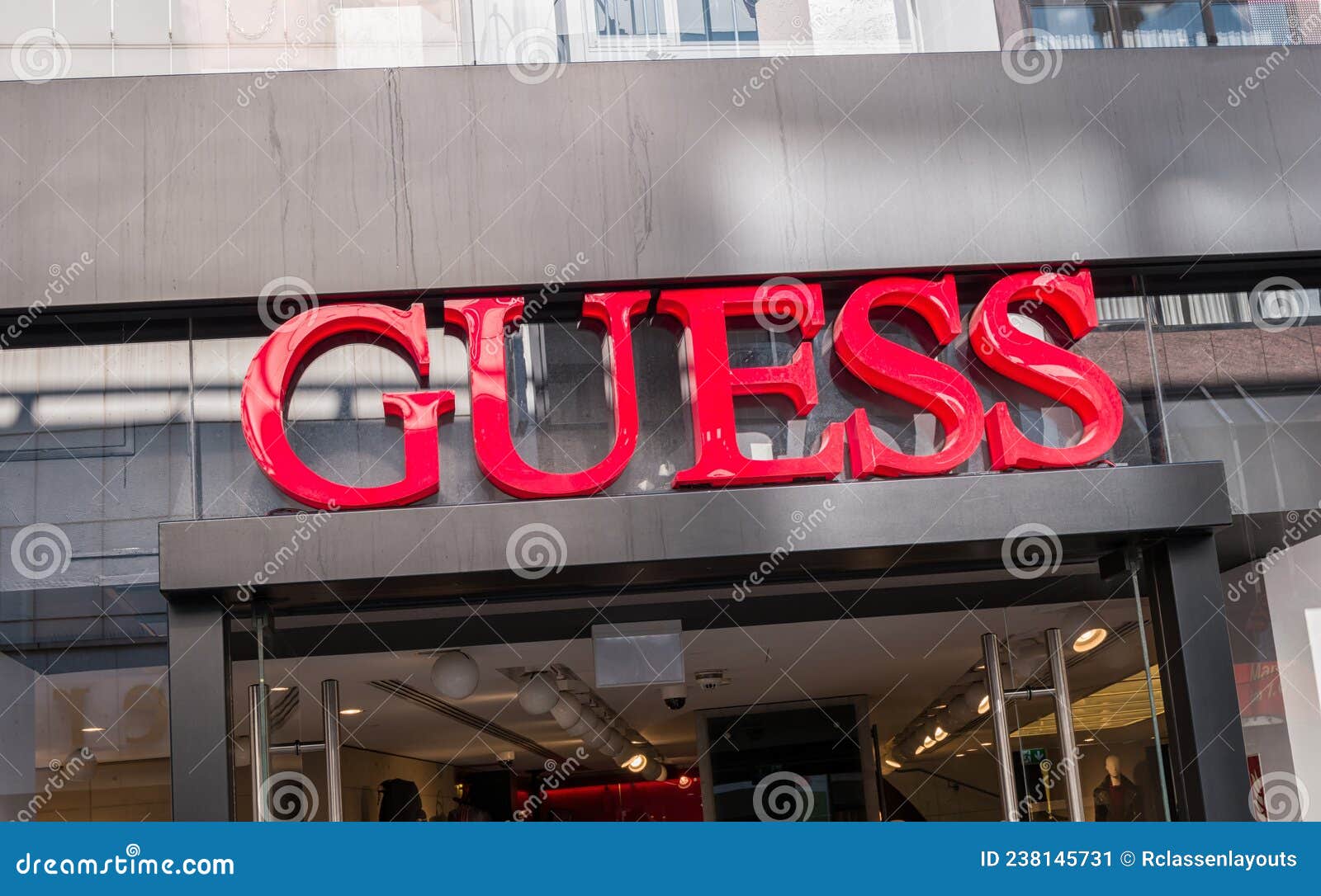 COLOGNE, GERMANY OCTOBER, 2017: Guess Logo on a Store Front. Guess is ...