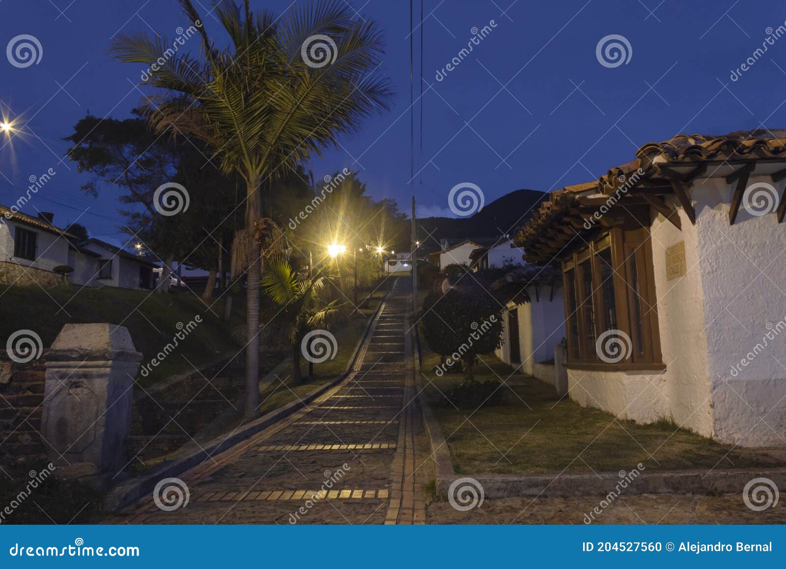 colombian guatavita colonial town night scene of an empty brick peatonal path