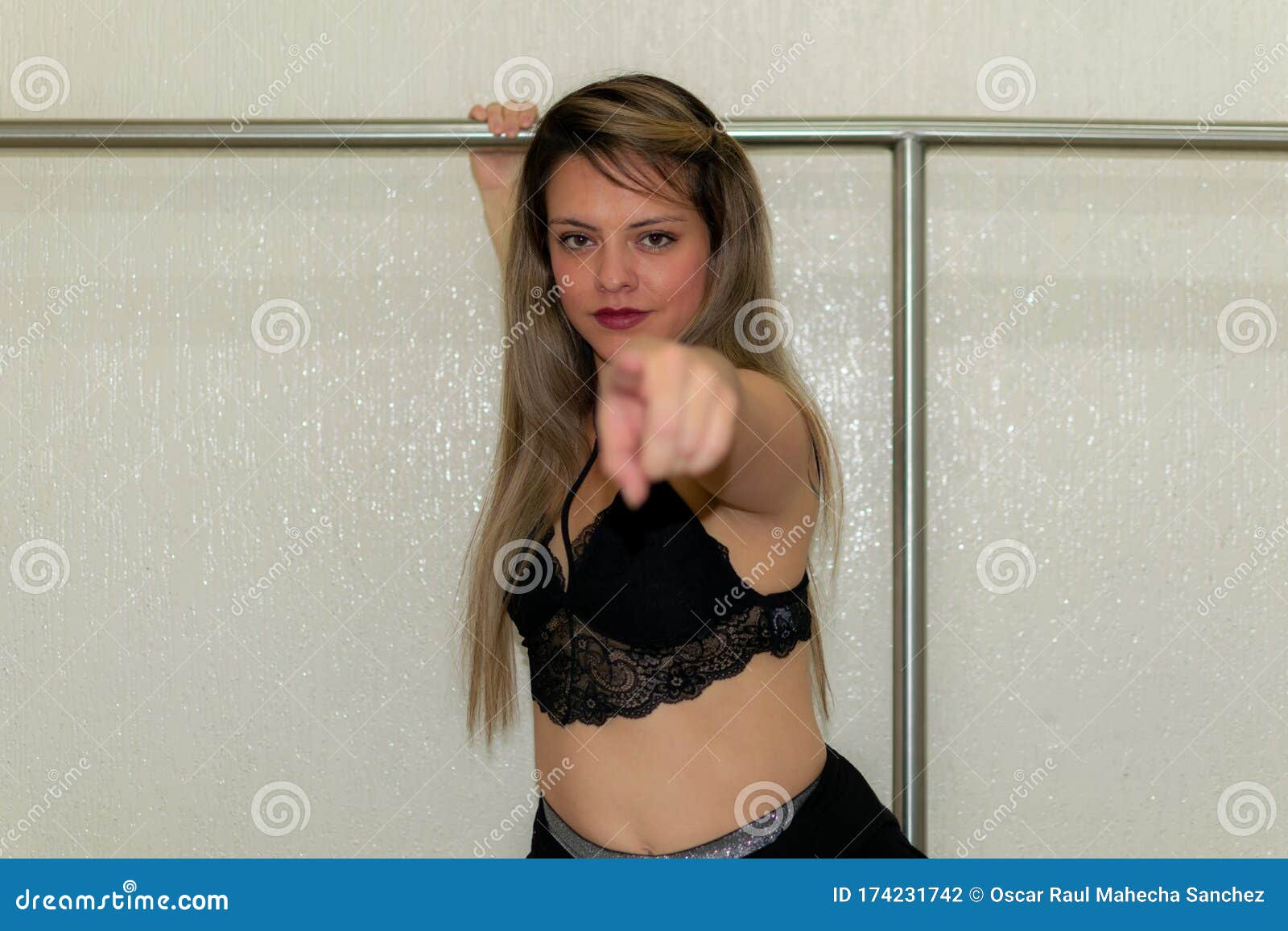 partial view of woman with slender body and sexy buttocks posing in lace  underwear and high boots Stock Photo by LightFieldStudios