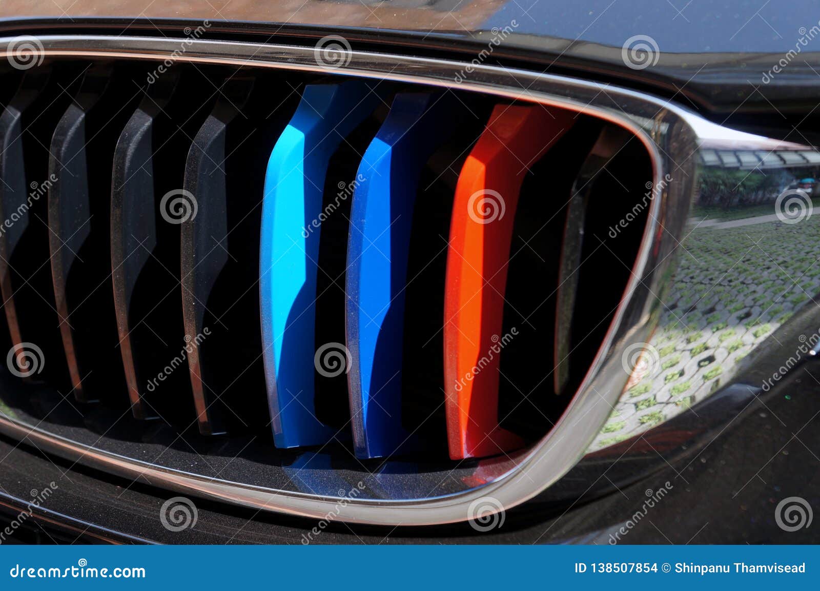 3 Color Blue , Dark Blue, Red on the Front Grill Car Stock Photo