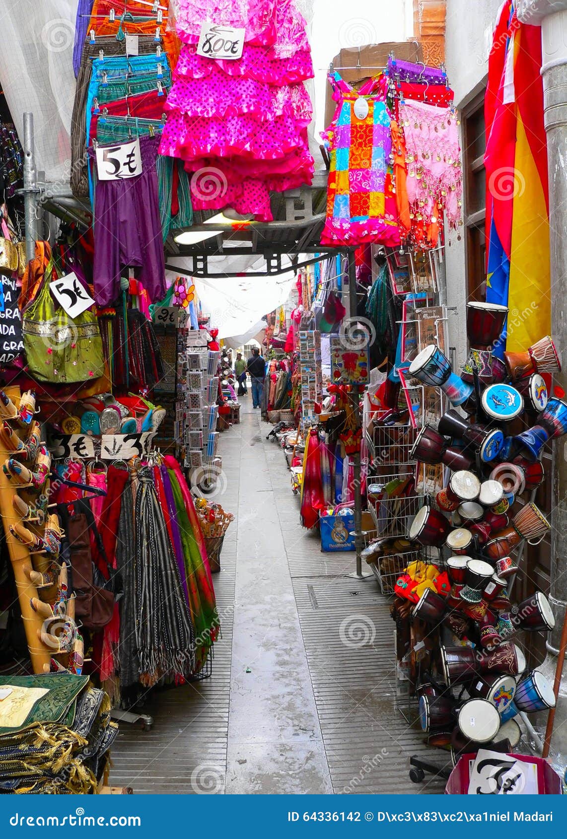 color cavalcade -arcade of shops in granada