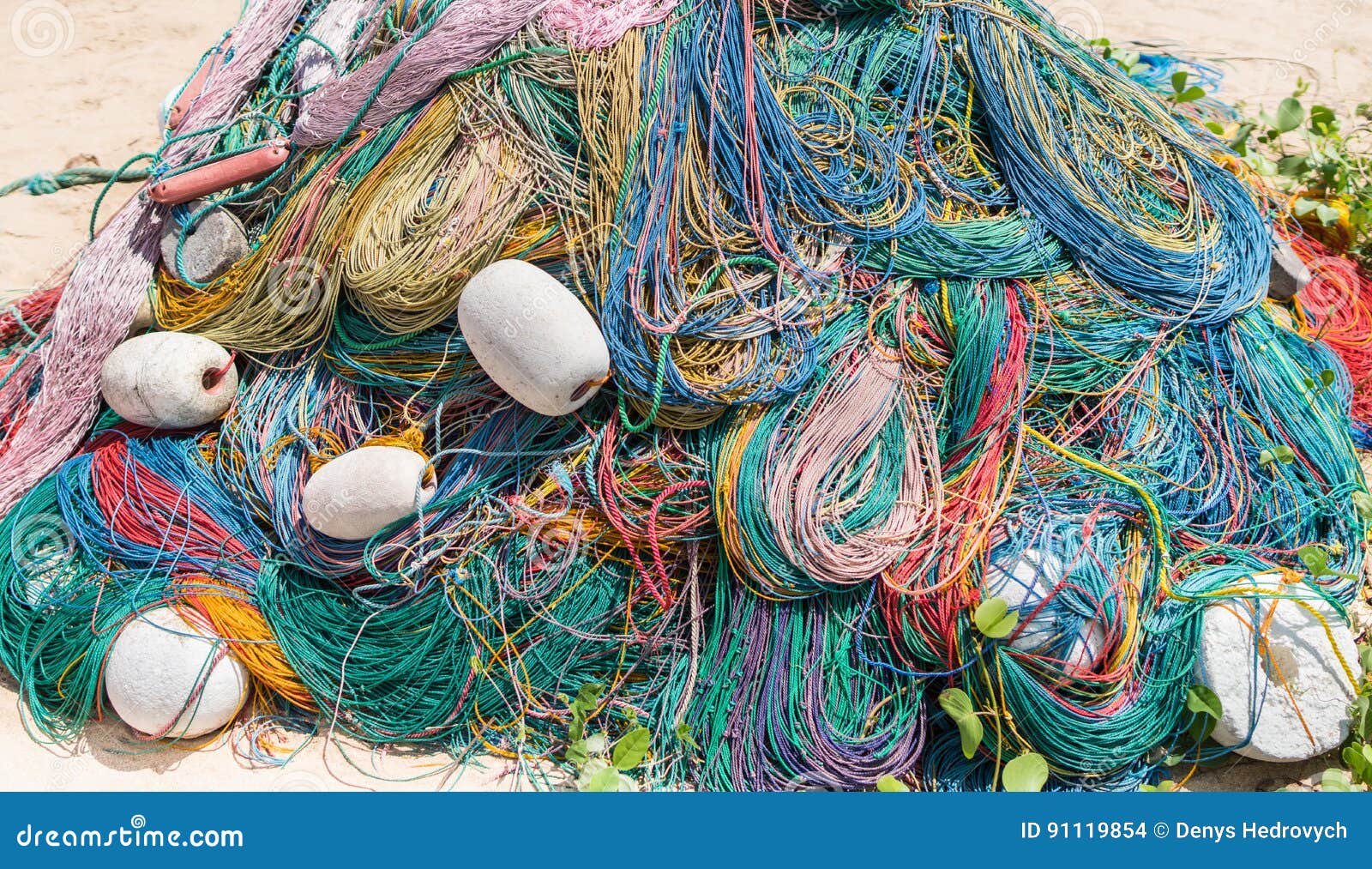 Color Fishing Net, Floats, Nylon Rope on the Bank Stock Photo