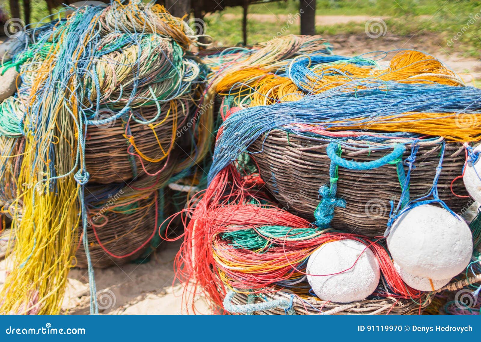 Color Fishing Net, Floats, Nylon Rope in the Basket on the Bank