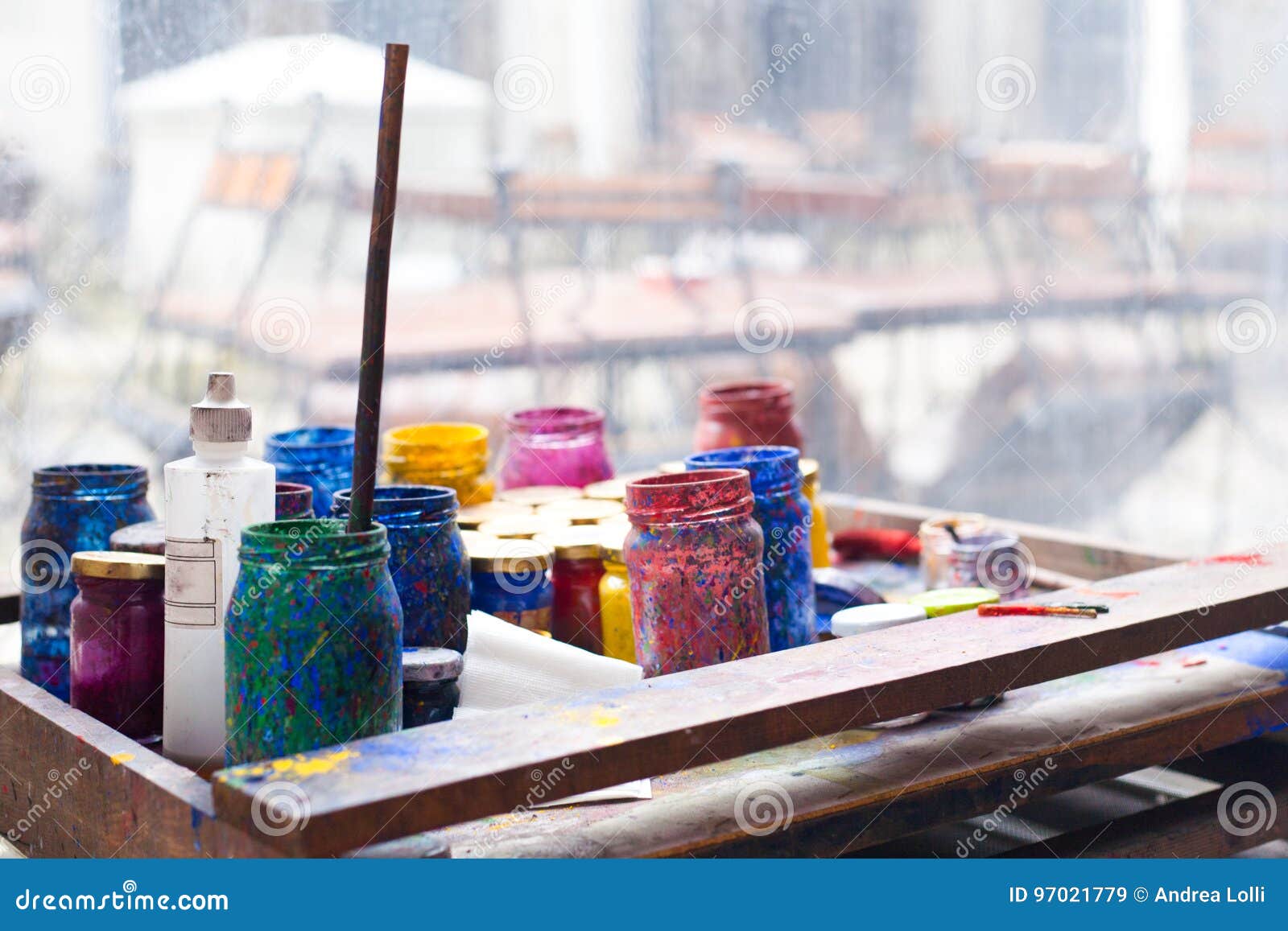 Color Jars and Tempera on Working Table in Ceramic Laboratory in Stock