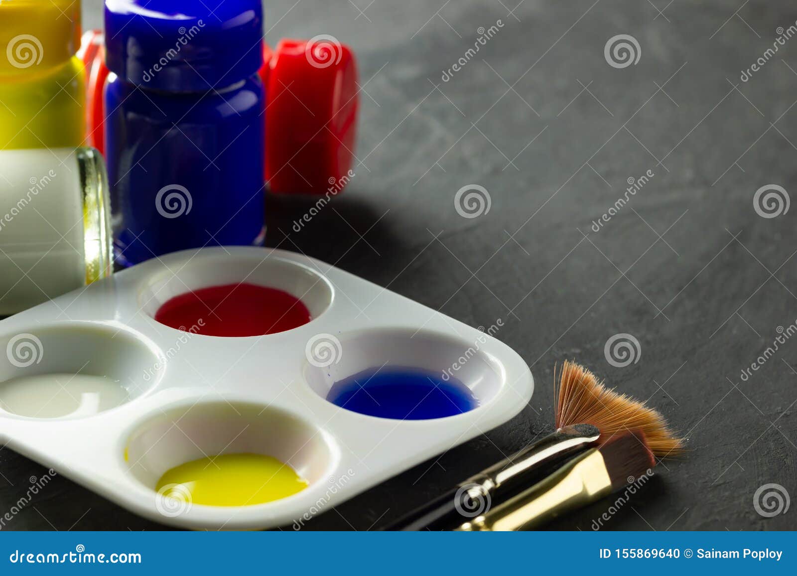 Color Palette and Artist Paint Brush with Poster Color Bottle on the ...