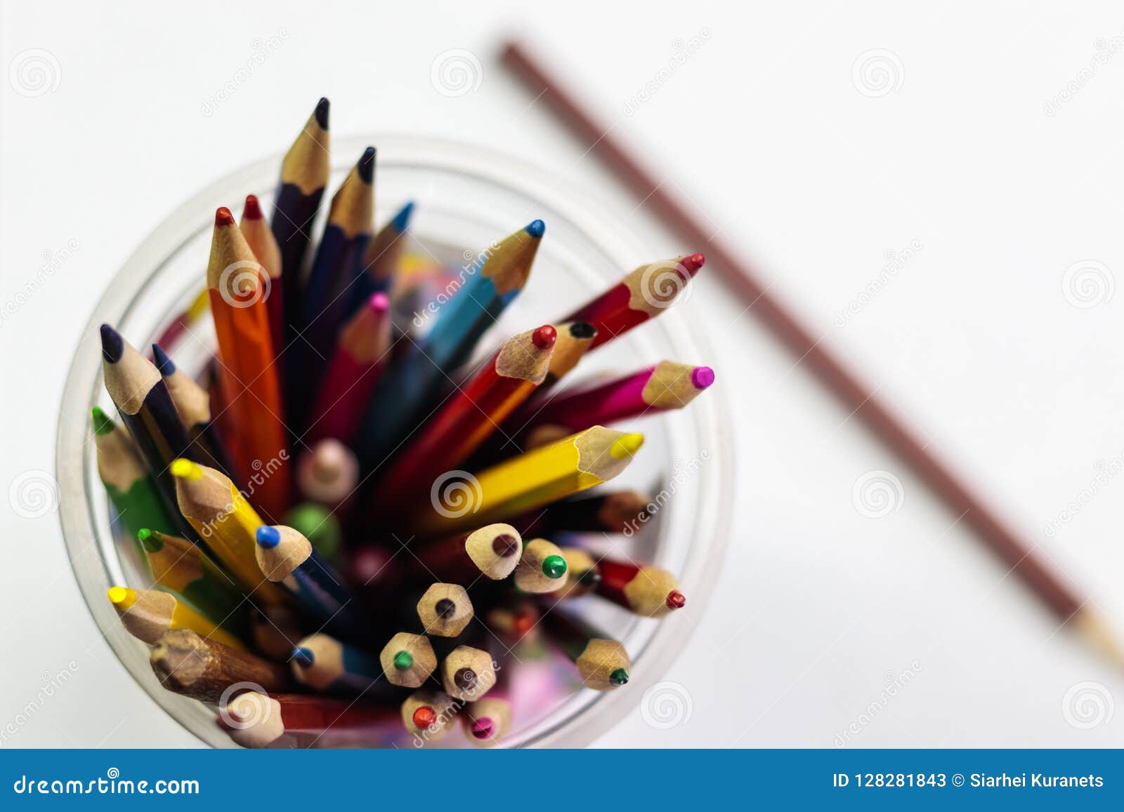Color Pencils in a Glass on a Sheet of White Paper Stock Image Image