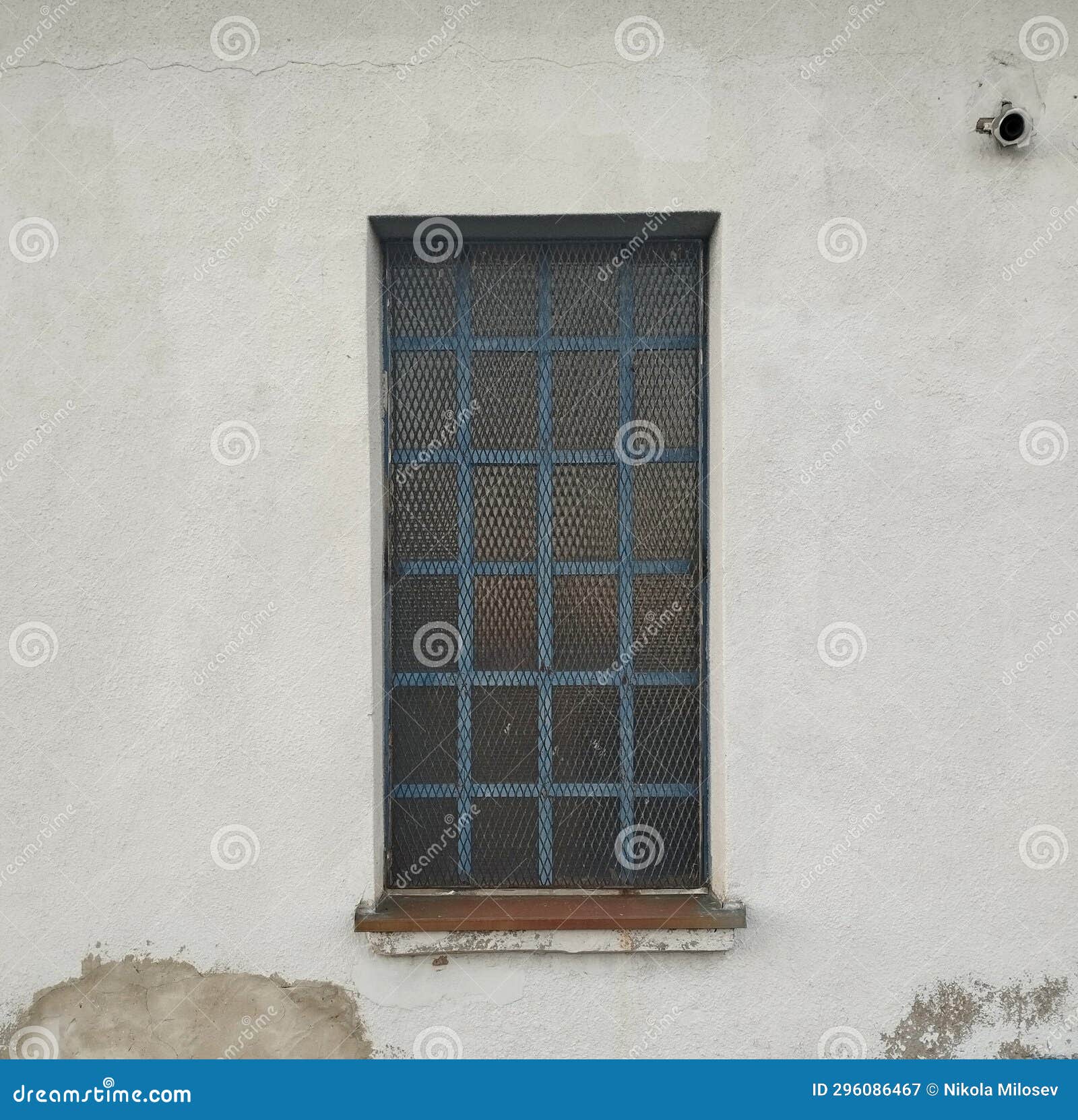 gridded window on industrial buliding