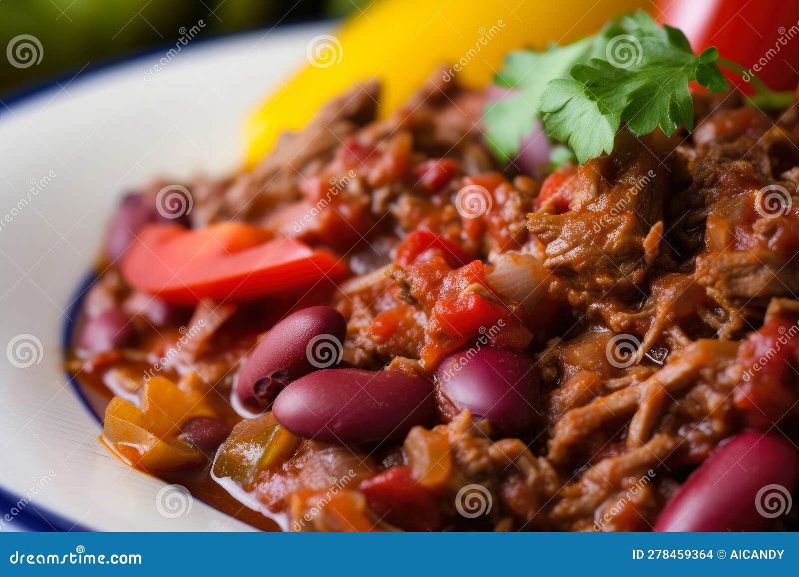 color your plate with a macro shot of chili con carne loaded with vibrant tomatoes and peppers