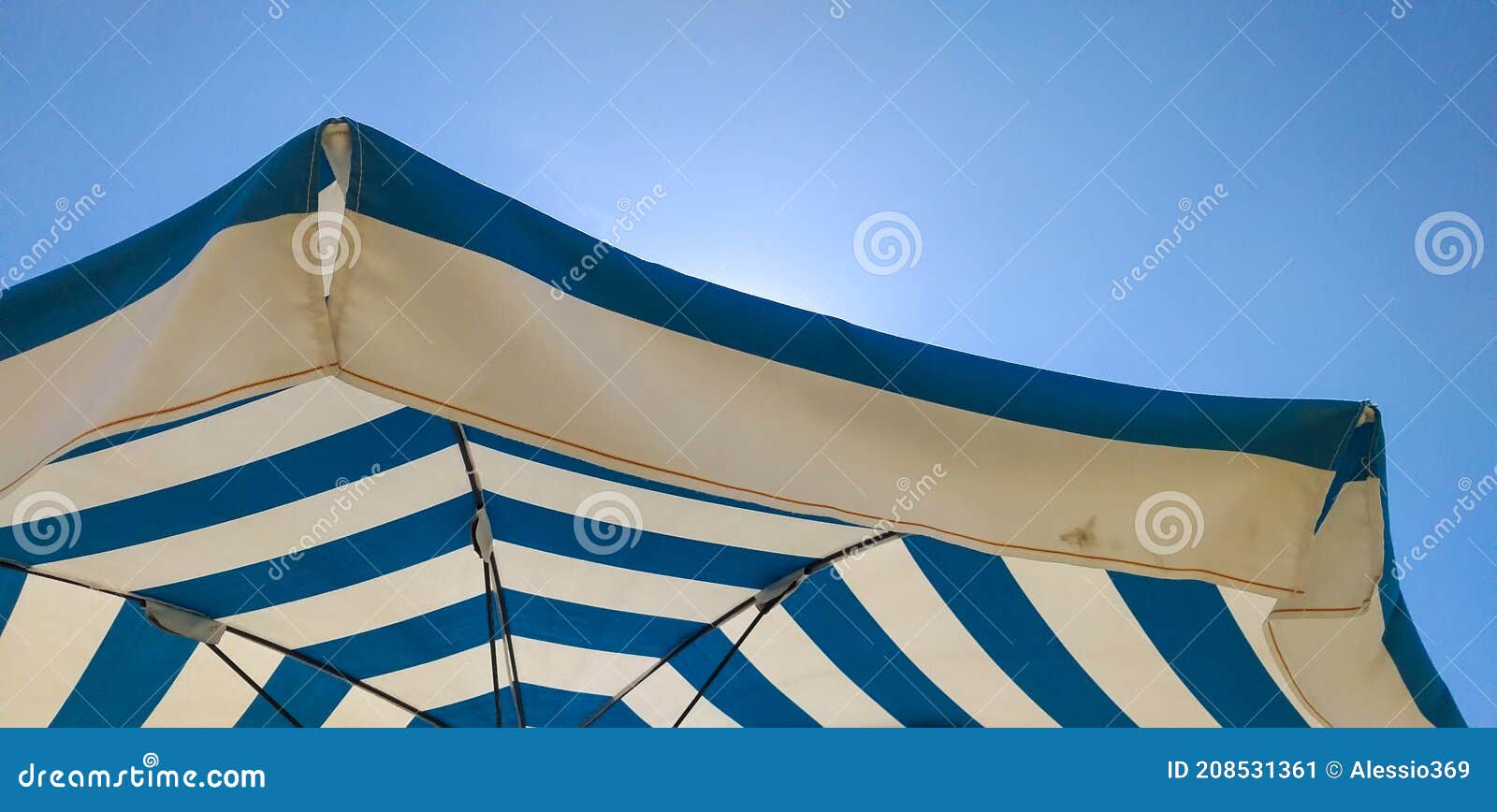 colored beach umbrella photographed from below