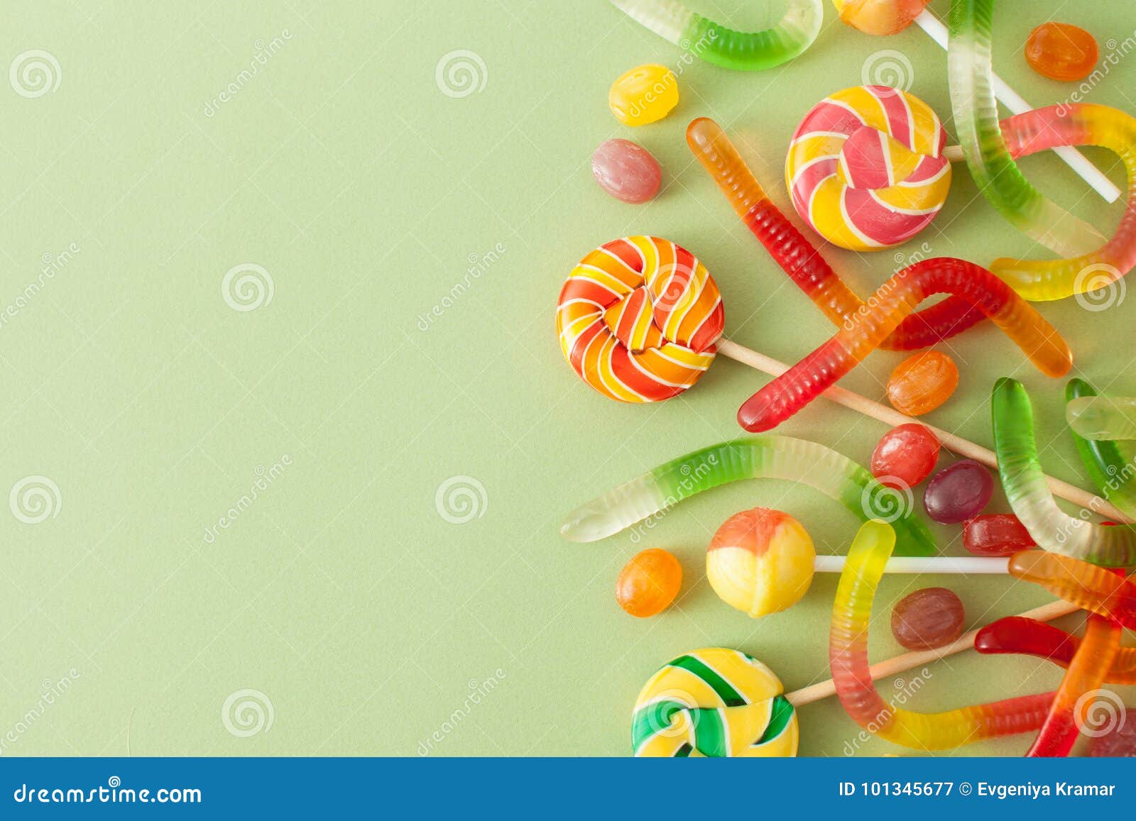 Colored Candies for Halloween on a Green Background Stock Image - Image ...