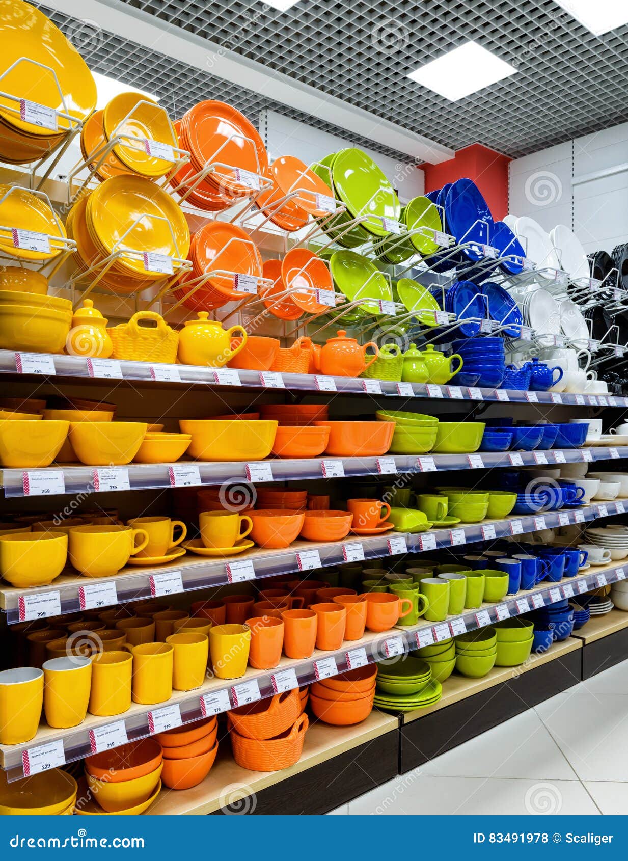Colored Ceramic Tableware in a Supermarket Editorial Stock Photo