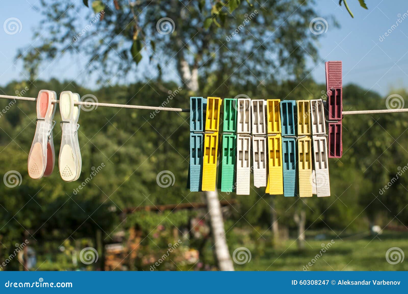 Colored clothesline clips stock image. Image of clean - 60308247