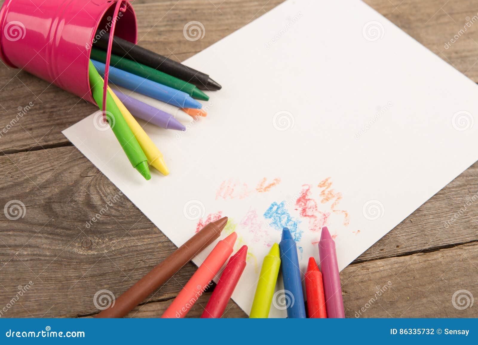 Colored Crayons and Blank Page on the Wooden Table Stock Photo Image