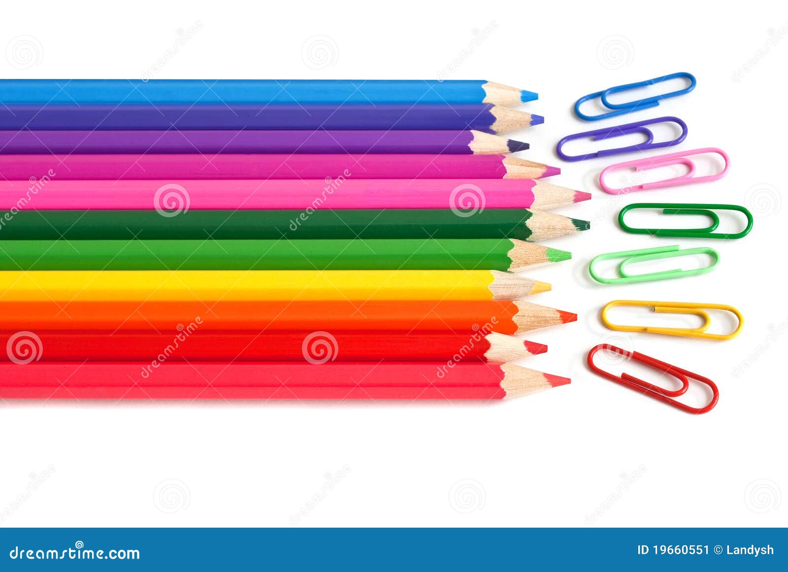 colored crayons and paper clips, office stationery